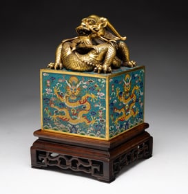 CHINESE IMPERIAL GILT BRONZE AND CLOISONNE DRAGON SEAL.