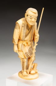 JAPANESE CARVED OKIMONO FIGURE.