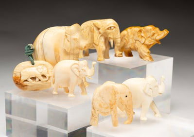 SEVEN MINIATURE ELEPHANT CARVINGS.