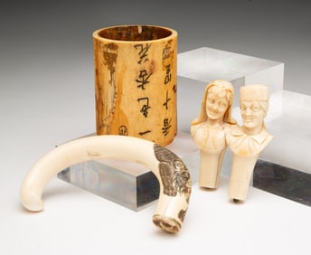 TWO CARVED WAX SEAL HANDLES, A CARVED HANDLE, AND A CARVED CYLINDER.