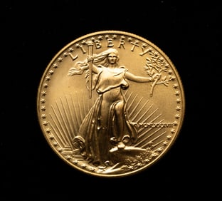 1986 U.S. 50-DOLLAR LIBERTY EAGLE GOLD COIN.