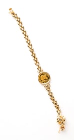 14K ELIZABETH II COOK ISLANDS ENDANGERED SPECIES COIN BRACELET.