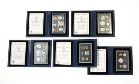 FIVE CASED U.S. MINT SETS.