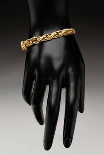 18K YELLOW GOLD BYZANTINE LINK BRACELET.: Italy, contemporary. Marked. Box tab closure. 0.25"w. 7"l. Approximately 12.4g. **Note: Bidders who are not yet established with our firm will be required to pay for jewelry, coins, and precious metal