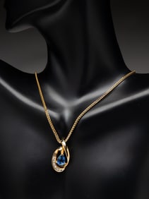 14K YELLOW GOLD DIAMOND AND GEMSTONE PENDANT NECKLACE.