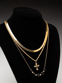 THREE 14K YELLOW GOLD NECKLACES.