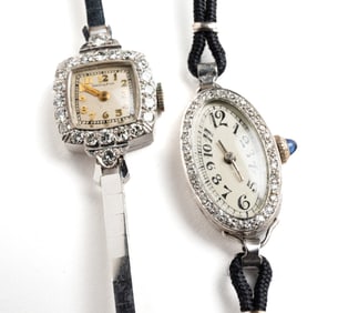 TWO VINTAGE LADY'S PLATINUM AND DIAMOND WRISTWATCHES.