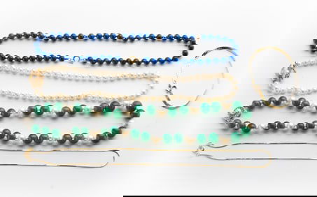 STRAND OF PEARLS AND TWO MORE STRANDS OF BEADS.