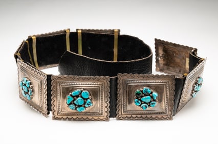 SIGNED NAVAJO STERLING AND TURQUOISE CONCHO BELT.