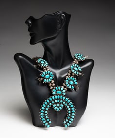 NAVAJO STERLING AND TURQUOISE SQUASH BLOSSOM NECKLACE.
