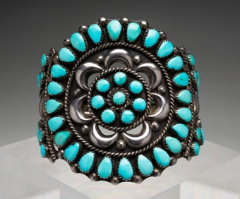 SILVER AND TURQUOISE CUFF BRACELET.