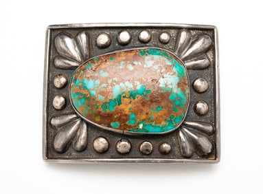 SIGNED NAVAJO STERLING AND TURQUOISE BELT BUCKLE.