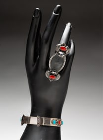 TWO NATIVE AMERICAN STERLING WATCH MOUNTS.