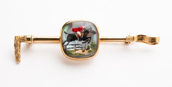 14K YELLOW GOLD PAINTED CRYSTAL EQUESTRIAN PIN.