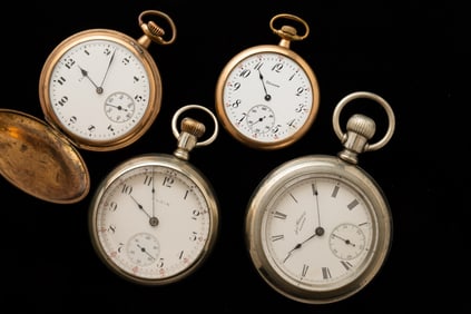 FOUR POCKET WATCHES.