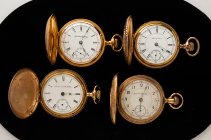 GROUP OF FOUR HUNTING CASE POCKET WATCHES.