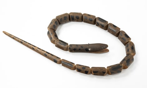 CARVED AND PAINTED ARTICULATED FOLK ART SNAKE.