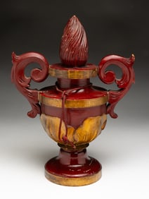 CARVED AND PAINTED FOLK ART FLAME URN.