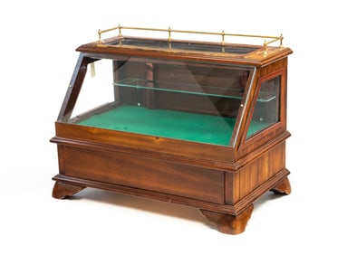 "JASPER CABINET" SLANT FRONT DISPLAY CASE.