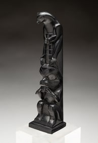 CARVED MODEL TOTEM POLE BY CAPTIAN ANDREW BROWN (1879-1962).