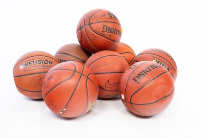 EIGHT (8) AUTOGRAPHED BASKETBALLS.