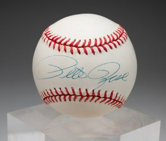 AUTOGRAPHED BASEBALL BY PETE ROSE.