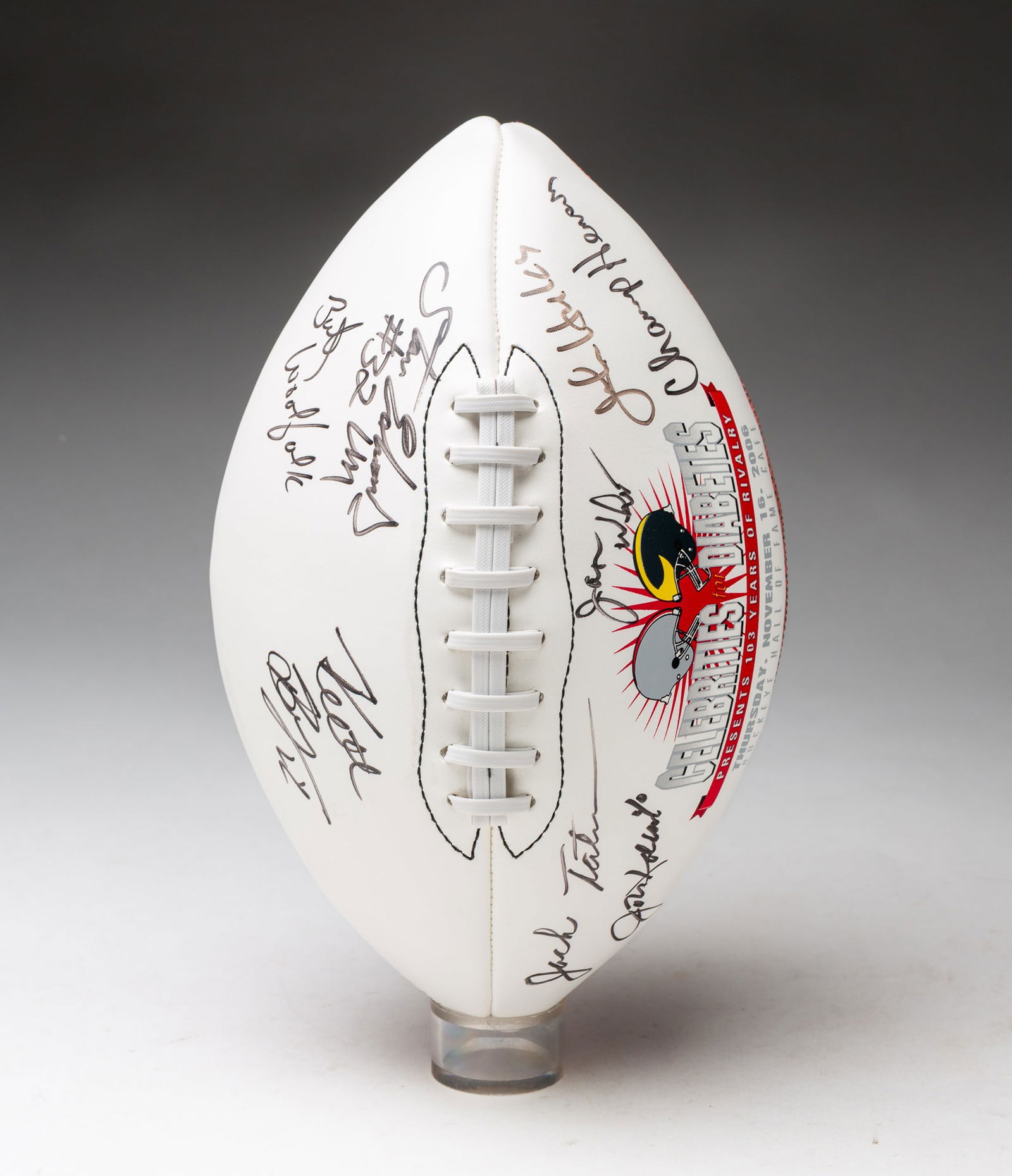 AUTOGRAPHED UNIVERSITY OF MICHIGAN AND OHIO STATE UNIVERSITY CHARITY EVENT FOOTBALL. (1 of 4)