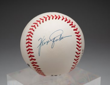 AUTOGRAPHED BASEBALL BY JIM "CATFISH" HUNTER AND WARREN SPAHN.