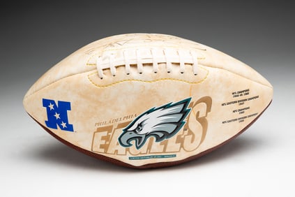 PHILADELPHIA EAGLES COMMEMORATIVE FOOTBALL AUTOGRAPHED BY BRIAN DAWKINS AND DAVID AKERS.