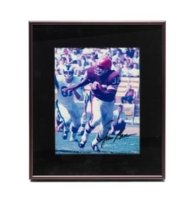 AUTOGRAPHED PHOTO BY JIM BROWN.