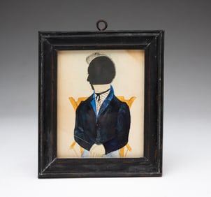 UNUSUAL AND FINE MINIATURE CUT PAPER AND WATERCOLOR SILHOUETTE OF A MAN.