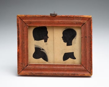 PAIR OF MINIATURE HOLLOW CUT SILHOUETTES.