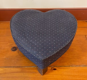 UNUSUAL HEART-FORM FOOTSTOOL.