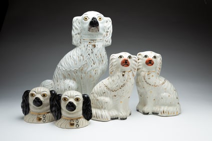 FIVE STAFFORDSHIRE PORCELAIN DOGS.