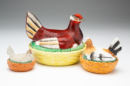 THREE STAFFORDSHIRE HENS ON NESTS.