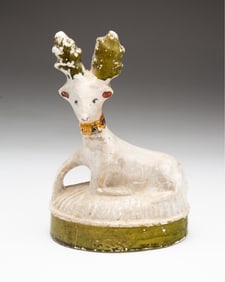 PAINTED CHALKWARE DEER.