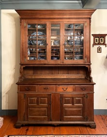 OHIO TWO-PIECE WALNUT CUPBOARD BY CHRISTIAN SHIVELY JR. (1770-1836) .