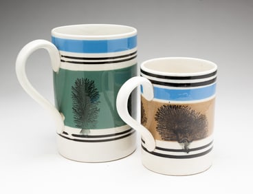 TWO MOCHAWARE DECORATED MUGS.