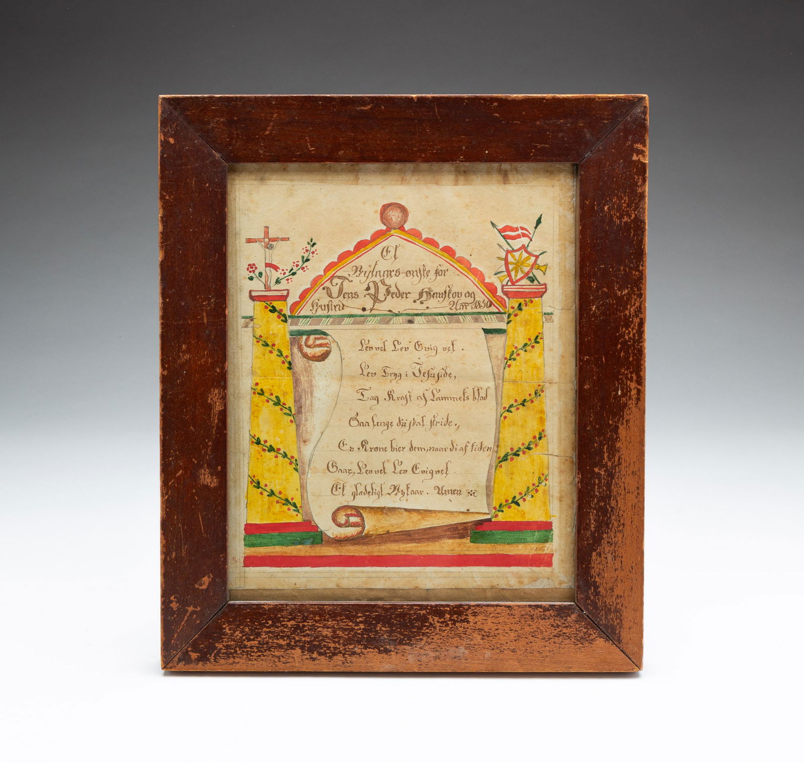 WATERCOLOR FRAKTUR DATED NOVEMBER 1850.: American, mid 19th Century. On heavy paper. Religious verse on a scroll flanked by two yellow Doric columns with vining flower, the left topped with a crucifix, the right with a shield and spears, the