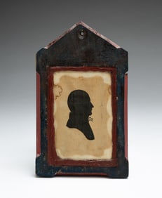 CARVED WOOD FRAME WITH HOLLOW CUT SILHOUETTE OF A GENTLEMAN.