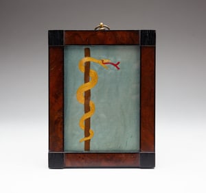 ODD FELLOWS EMBROIDERY OF SNAKE STAFF.