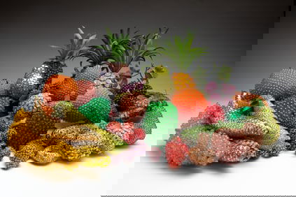A COLLECTION OF SPARKLY FRUIT AND VEGETABLES.