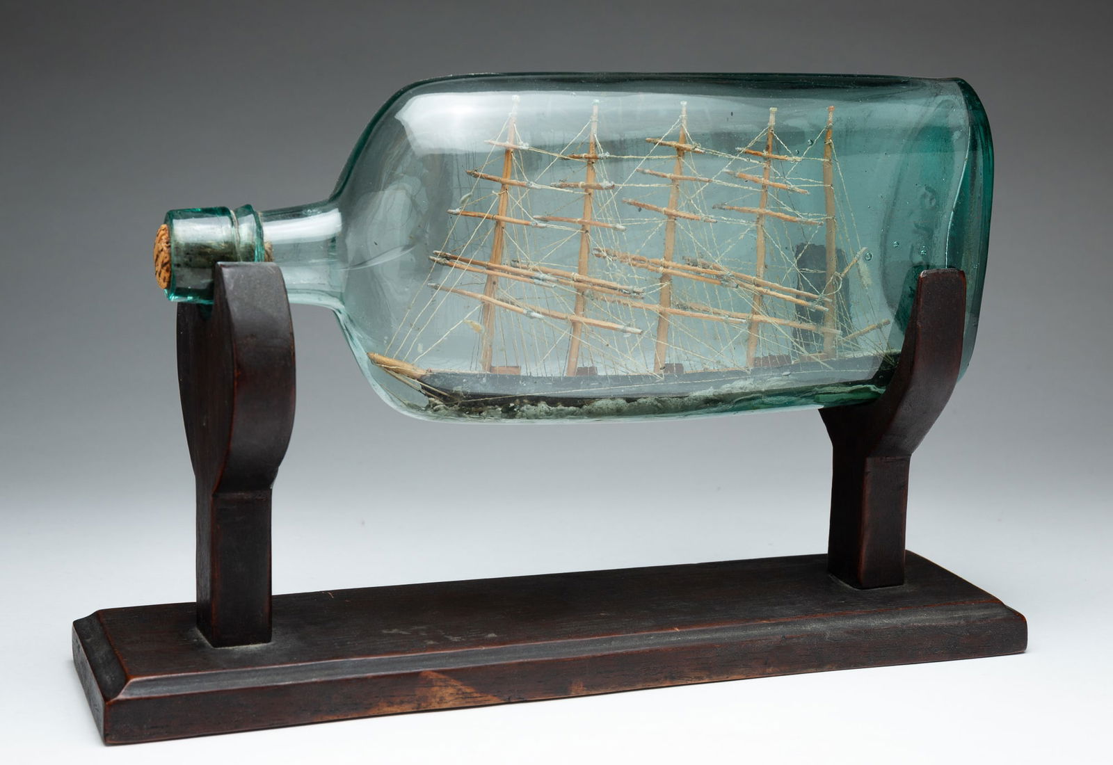 FOLK ART FIVE MASTED SHIP IN A BOTTLE ON STAND. (1 of 4)