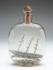 DIMINUTIVE FOLK ART SHIP IN A BOTTLE.