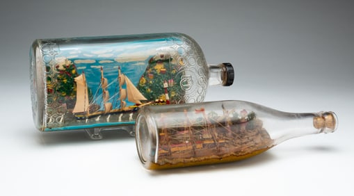 TWO FOLK ART SHIPS IN BOTTLES.