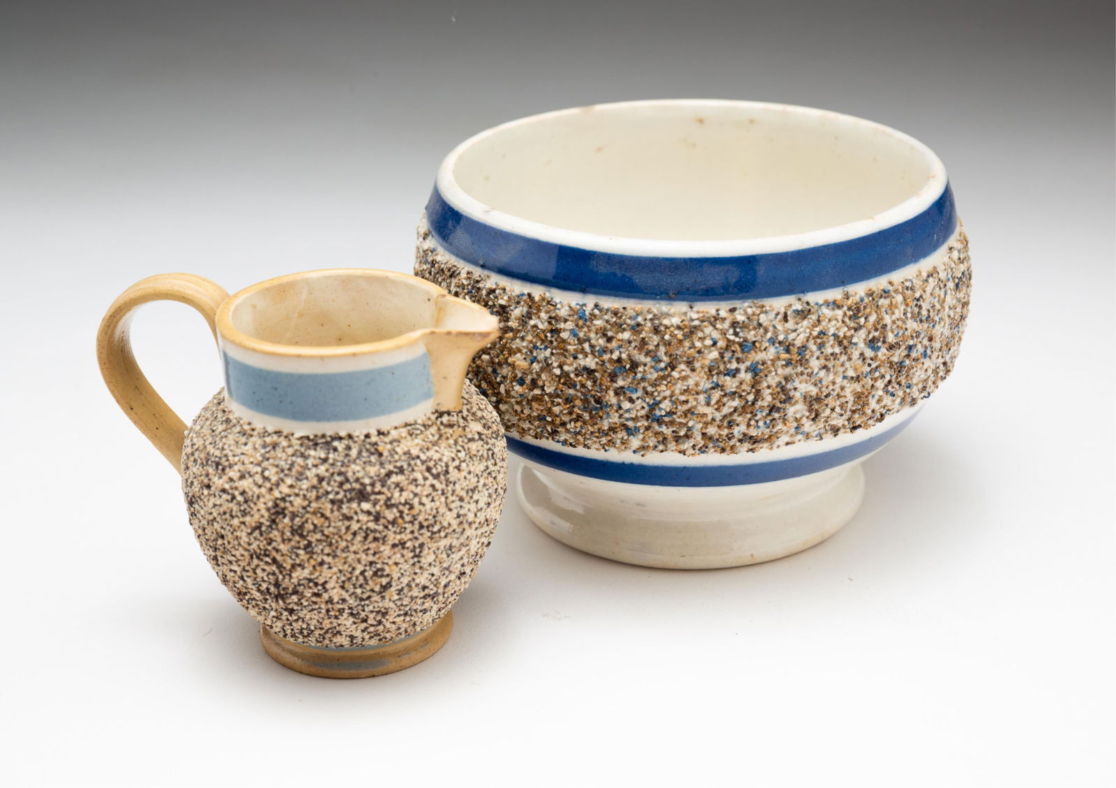 TWO MOCHAWARE SAND DECORATED ITEMS. (1 of 3)