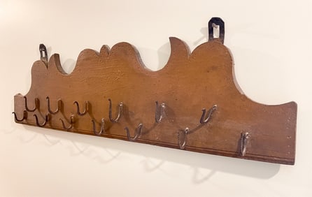 FOLKSY HANGING GAME RACK.
