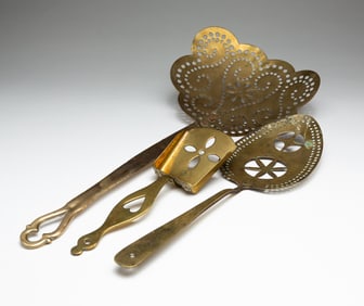 THREE HEAVY BRASS UTENSILS.