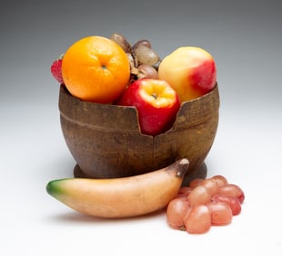 TURNED BOWL WITH WAX FRUIT.