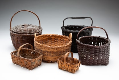 GROUP OF SIX MINIATURE BASKETS.